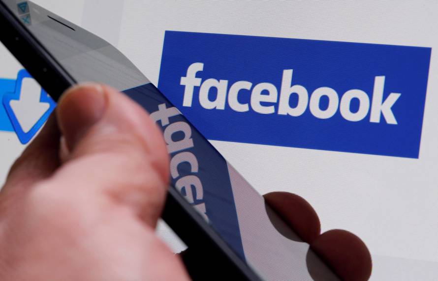 FILE PHOTO: The Facebook logo is displayed on the company's website in Bordeaux, France