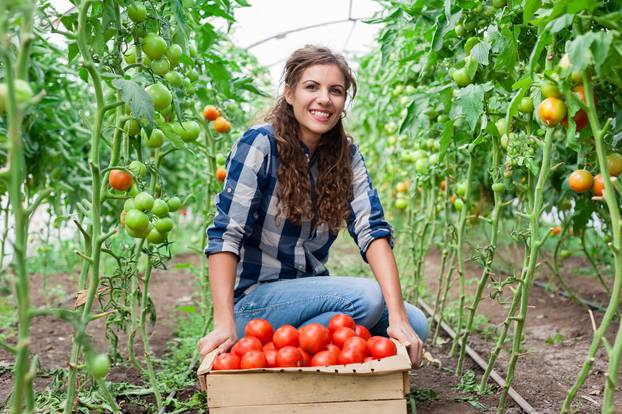 Young smiling agriculture woman worker