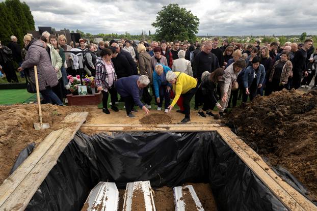 Funeral of the Tamara, Stanislav and Roman Martyniuk who were killed in a Russian missile strike in Korostyshiv