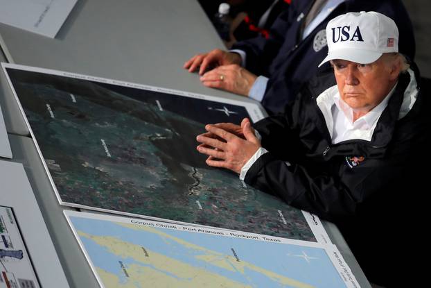 U.S. President Trump receives a briefing on Tropical Storm Harvey relief efforts in Corpus Christi