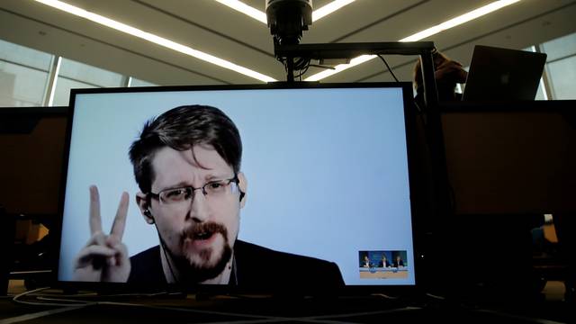 FILE PHOTO: Snowden speaks via video link as he takes part in a round table on the protection of whistleblowers at the Council of Europe in Strasbourg