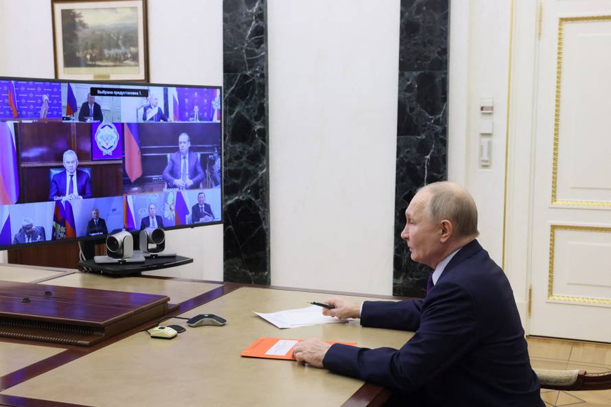 Russian President Putin chairs a meeting with members of the Security Council via video link in Moscow