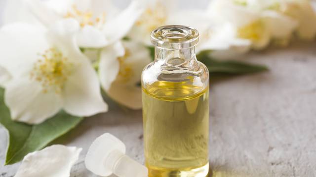 Oil of jasmine. Aromatherapy with jasmine oil. Jasmine flowers