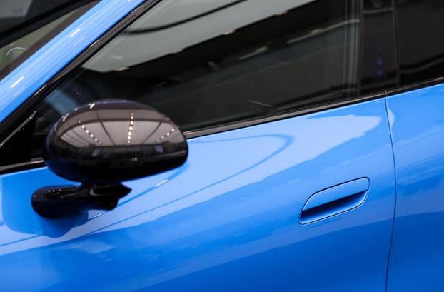 Chinese tech giant Xiaomi unveils new generation of SU7 electric vehicle, in Beijing