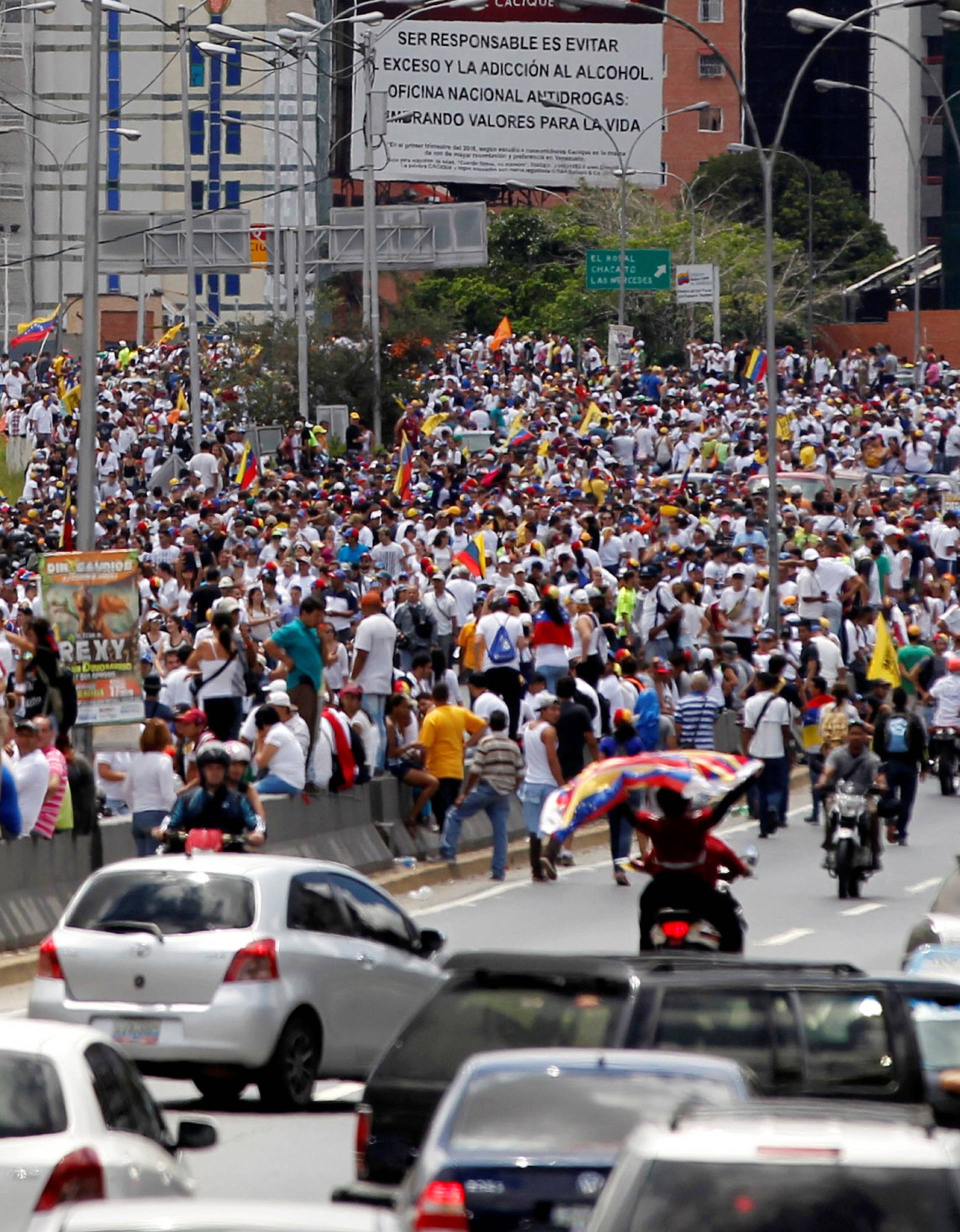 Opposition supporters take part in a rally to demand a referendum to remove Venezuela's President Nicolas Maduro, in Caracas, Venezuela