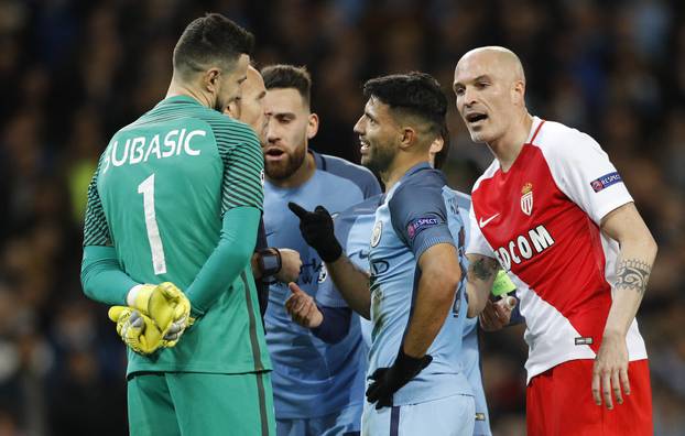 Manchester City's Sergio Aguero with referee Antonio Mateu Lahoz and Monaco's Danijel Subasic
