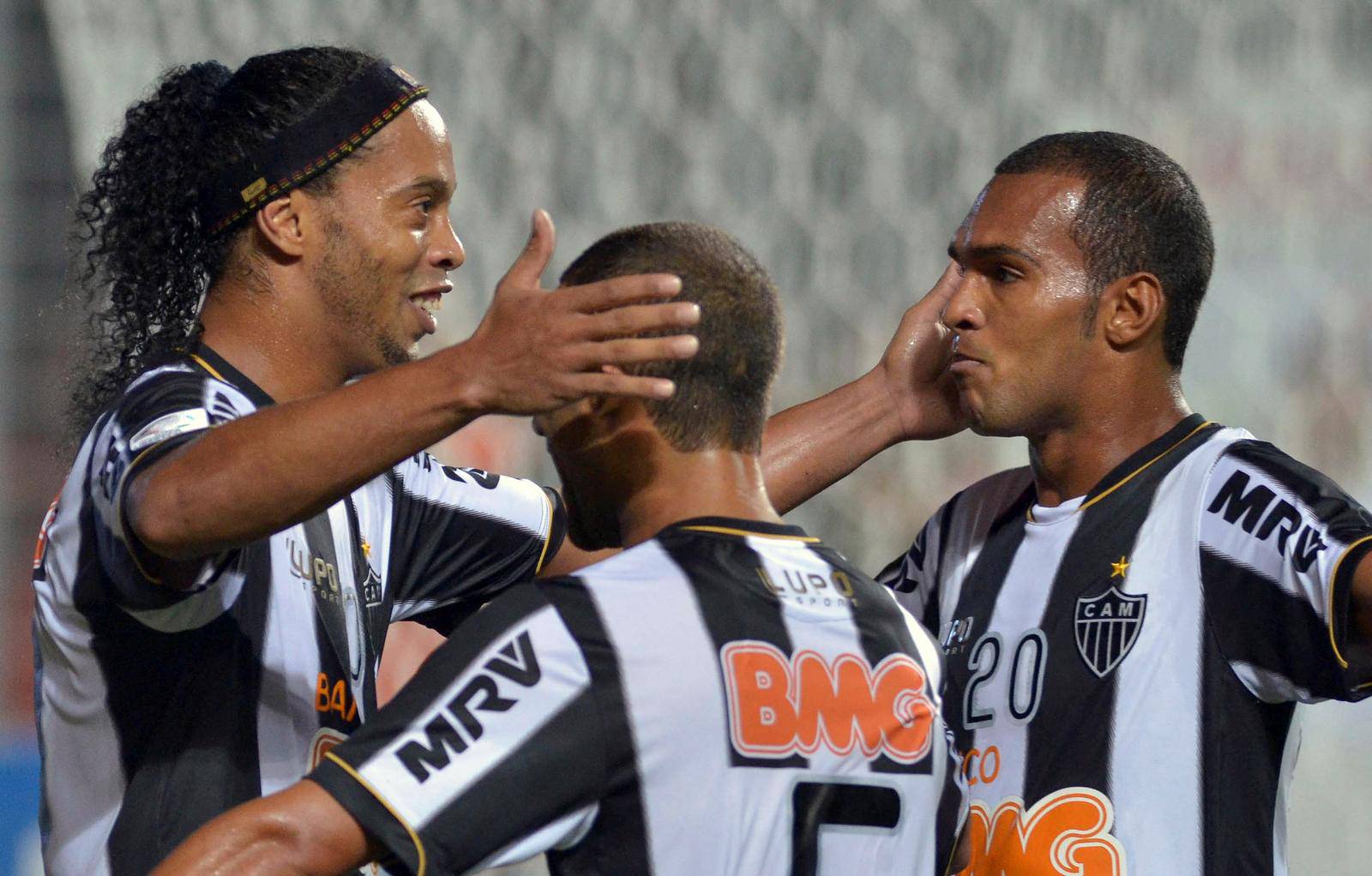 FILE PHOTO: Ronaldinho of Brazil's Atletico Mineiro celebrates scoring a goal against Bolivia's The Strongest with teammates during their Copa Libertadores soccer match in Belo Horizonte