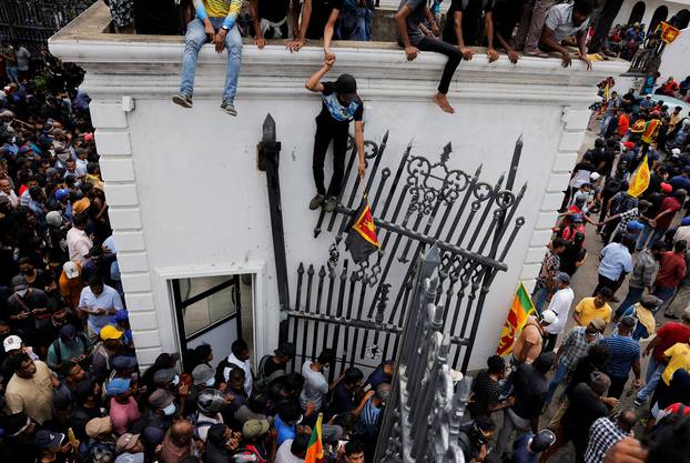 Demonstrators protest inside the President's House, after President Gotabaya Rajapaksa fled, in Colombo