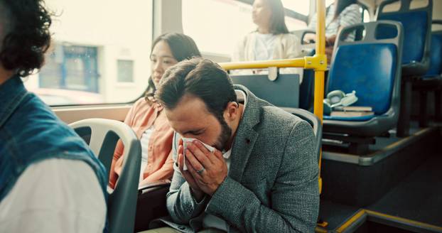 Sneeze, tissue or sick man on bus to travel with flu symptoms, sinus illness or bacteria. Nose, virus or person in city with nasal infection on public transport for allergy season or morning commute