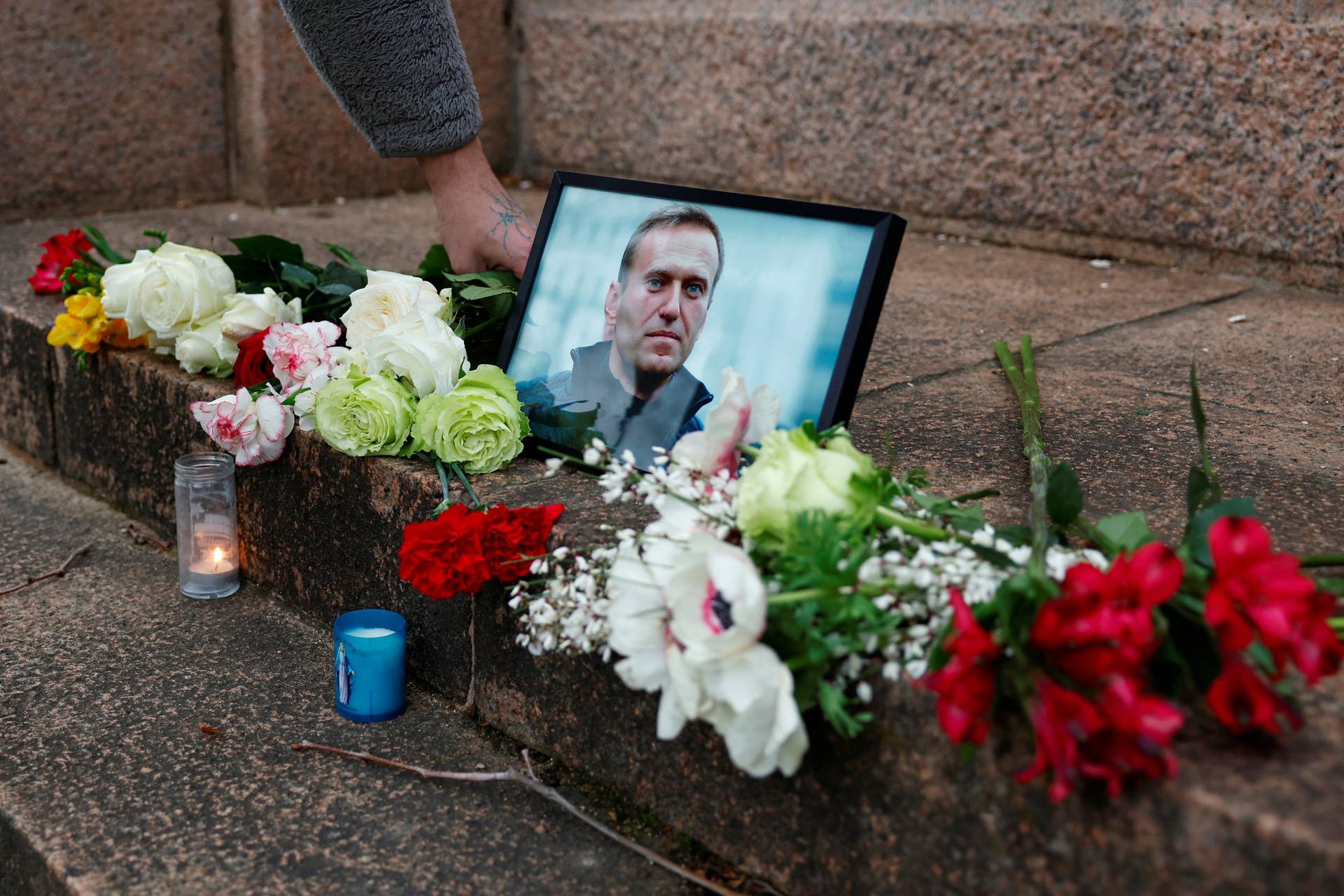 People gather in Paris following the death of Alexei Navalny