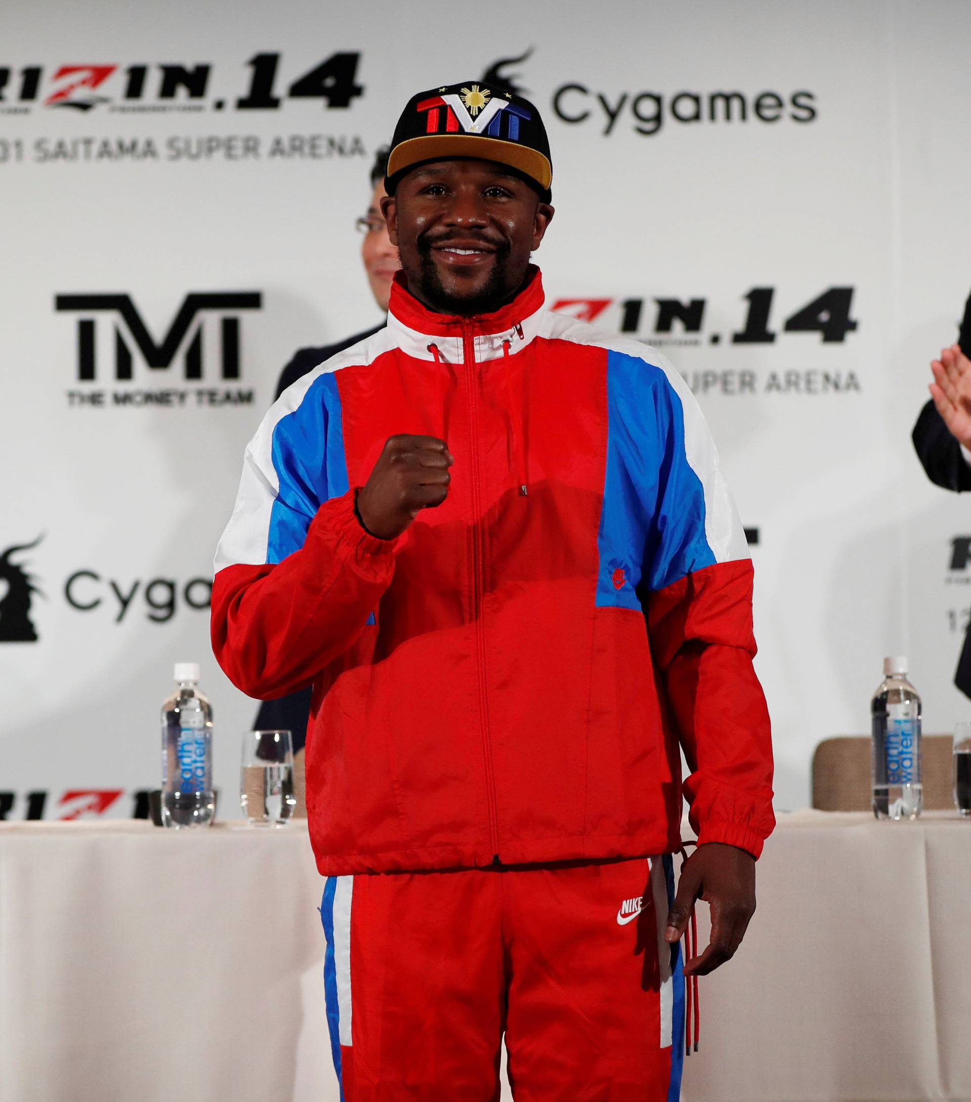 Undefeated boxer Floyd Mayweather Jr. of the U.S. attends a news conference inn Tokyo