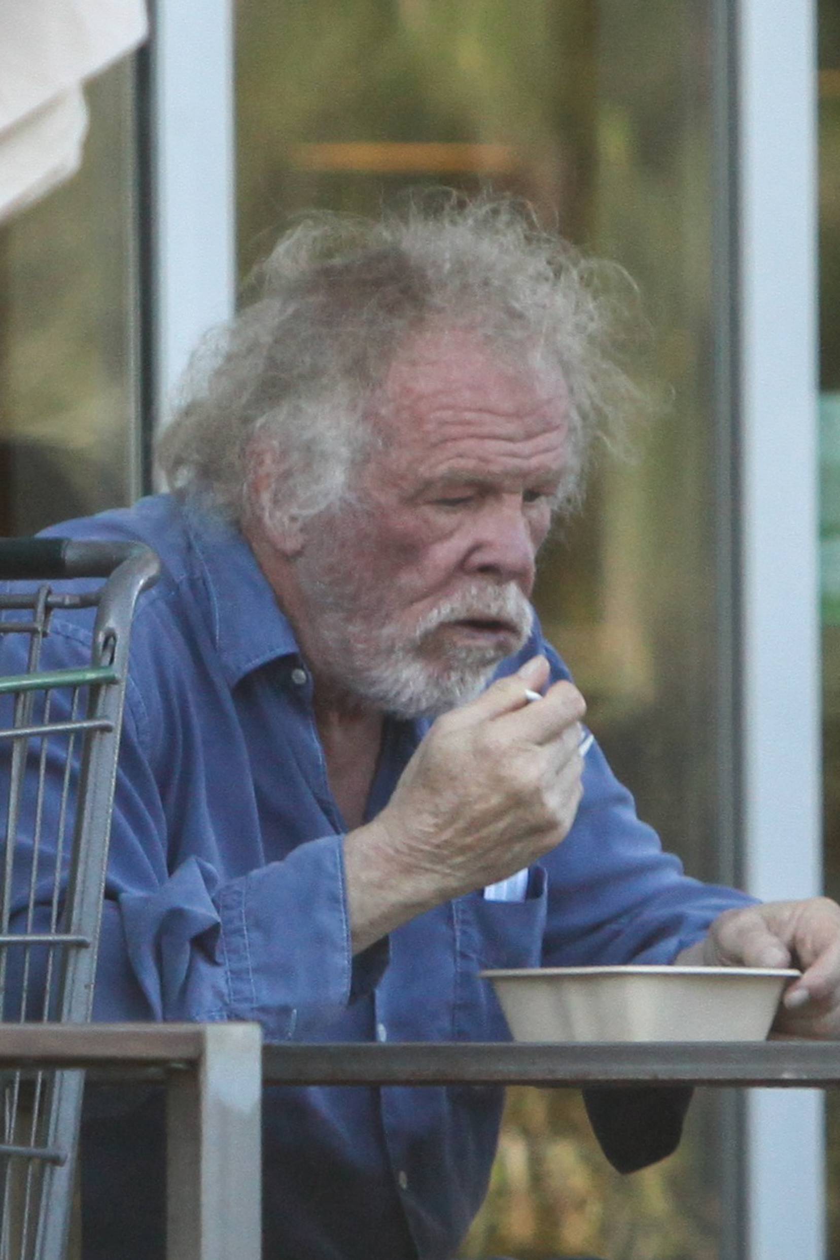 EXCLUSIVE: Nick Nolte has lunch and a smoothie with a friend while grocery shopping
