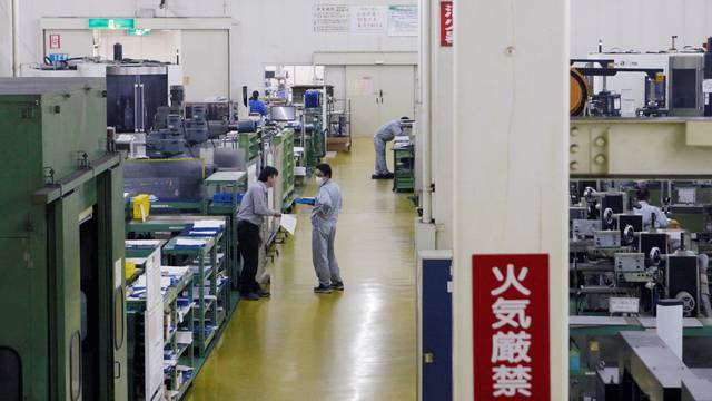 Workers are seen at the factory of Nagumo Seisakusho Co., Ltd. in Jyoetsu