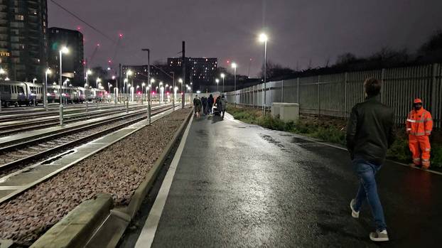 Passengers stranded for hours inside trains stuck on the Elizabeth Line after damaged overhead cables blocked railway lines in London