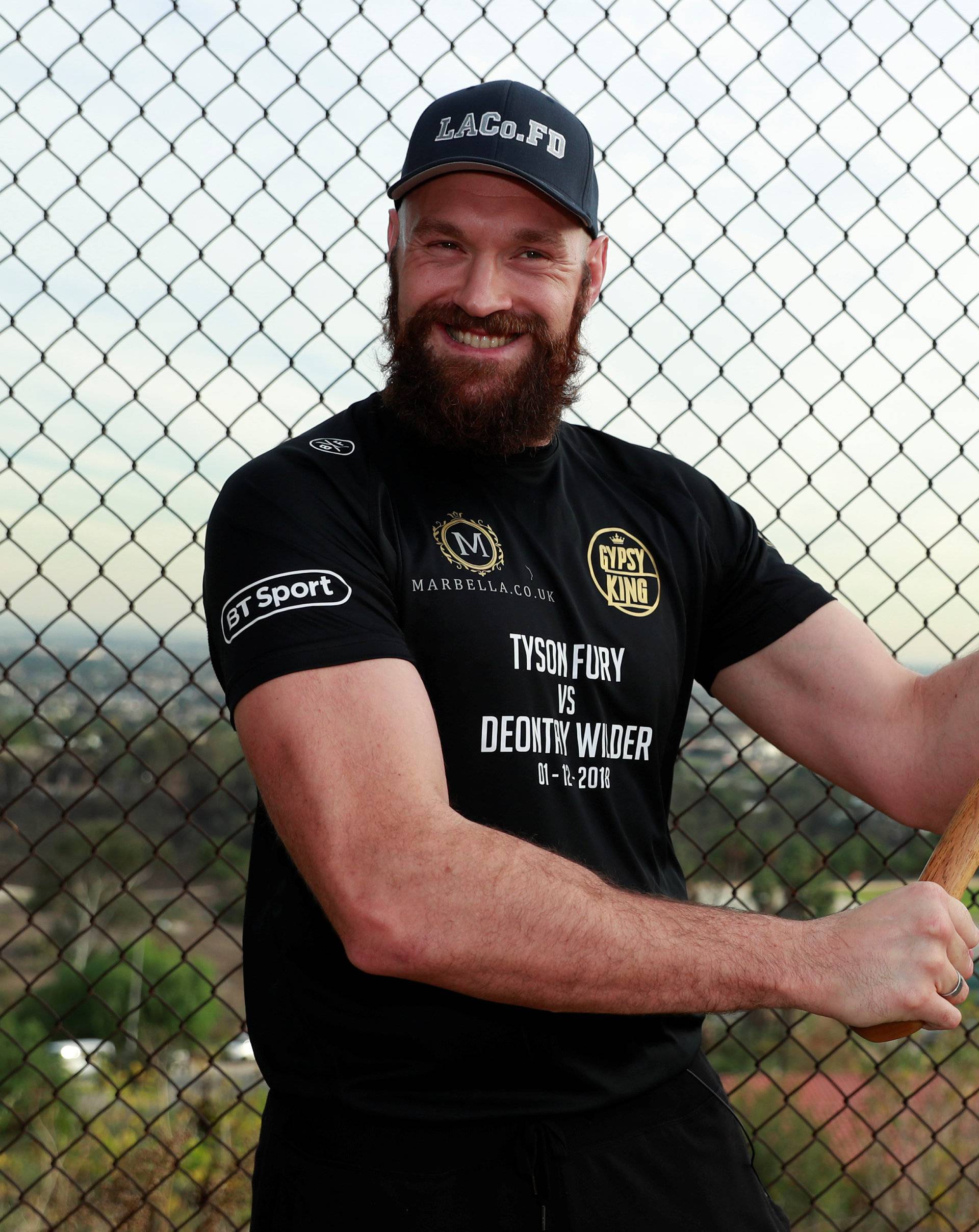 Tyson Fury presents tickets to LA firefighters ahead of his WBC heavyweight title fight with Deontay Wilder