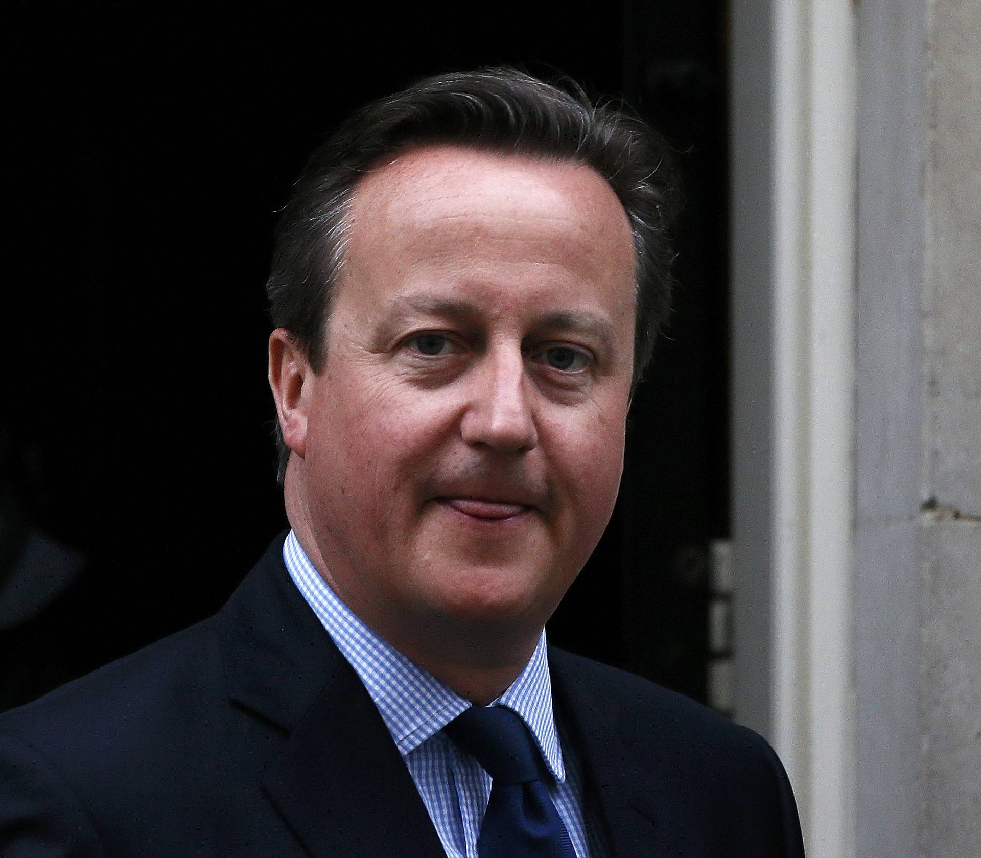 Britain's Prime Minister Cameron leaves Number 10 Downing Street in London