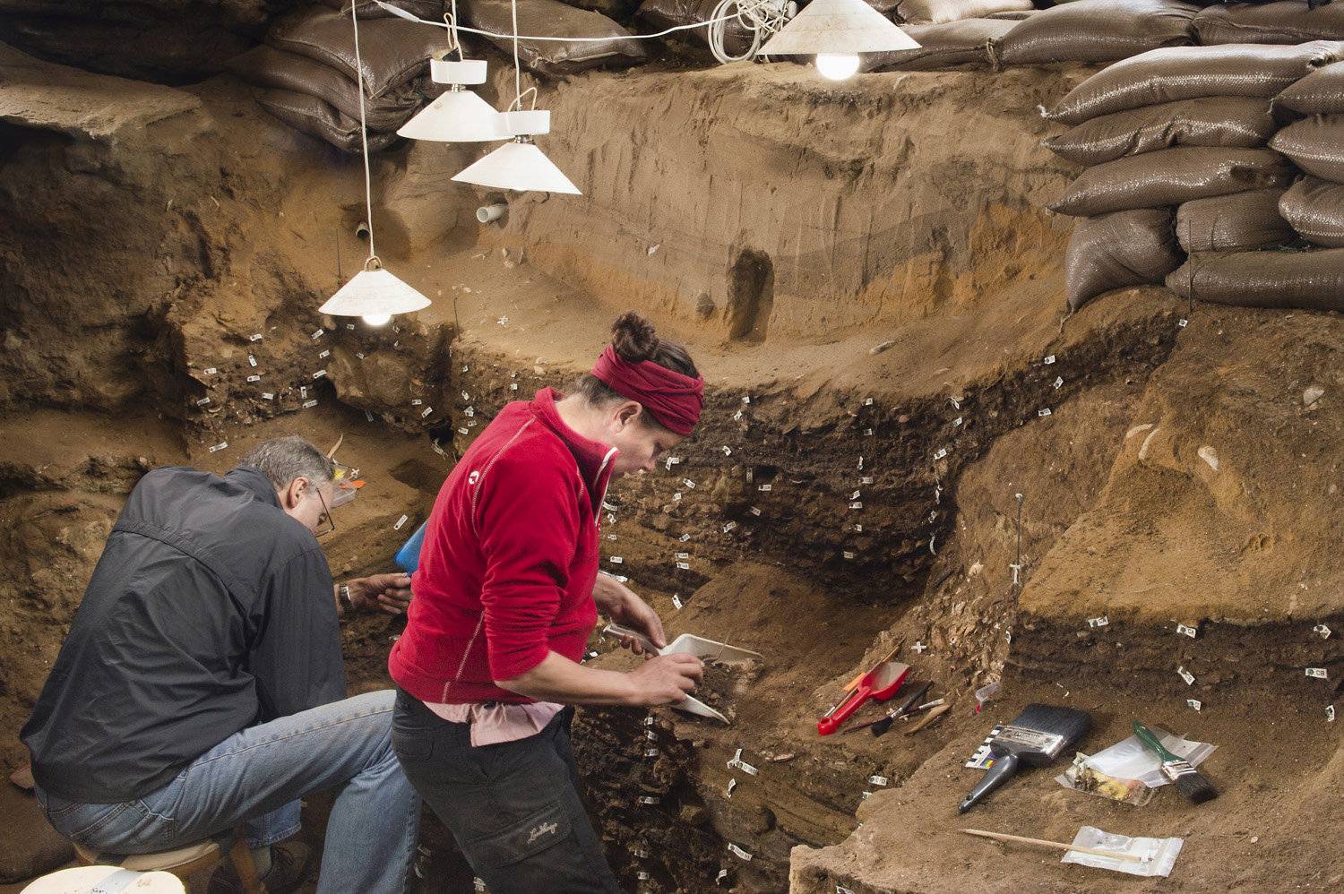 Researchers work inside Blombos Cave on South Africa's southern coast