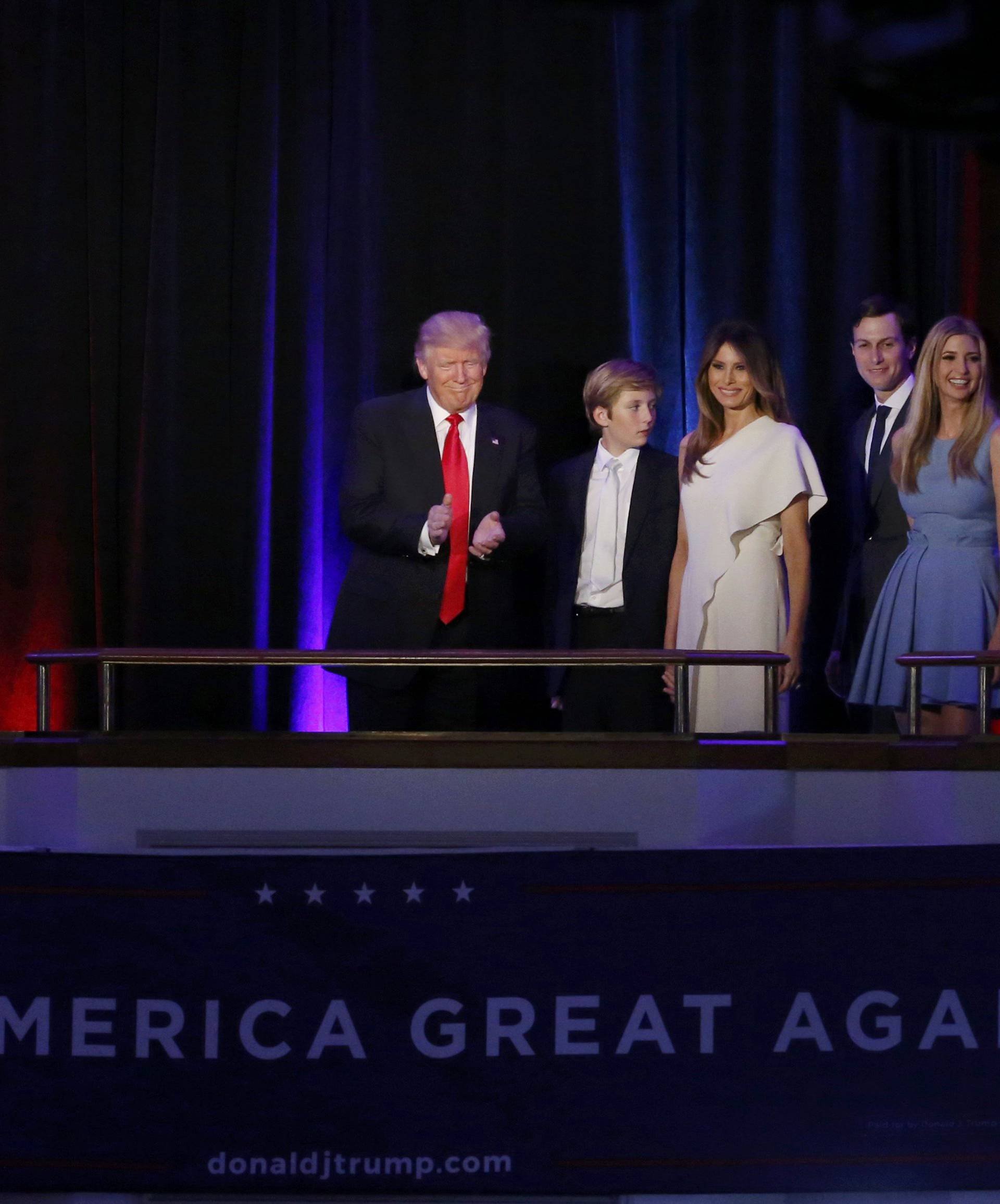 Republican U.S. presidential nominee Donald Trump is accompanied by members of his family as he arrives to address supporters at his election night rally in New York