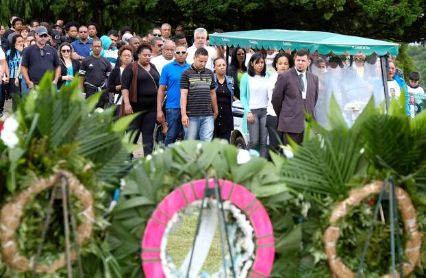Relatives and friends of Chapecoense soccer club player Matheus Biteco, who died in the plane crash in Colombia, attend his burial in Porto Alegre