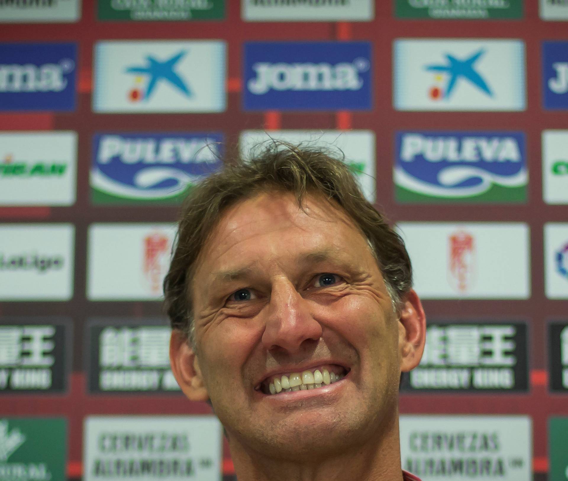 Former Arsenal and England captain Adams reacts after being presented as new head coach of Granada soccer club, in Granada