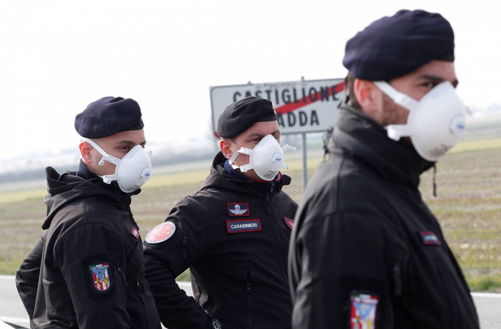 Carabinieri officers stand guard outside the town of Castiglione D'Adda