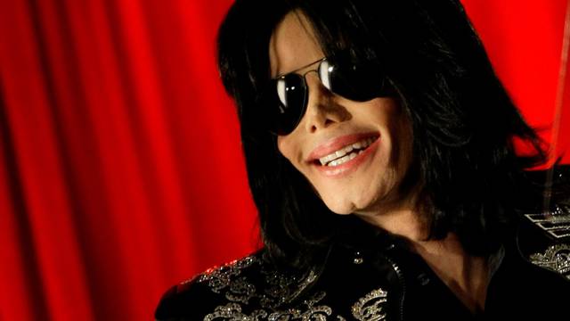 FILE PHOTO: U.S. pop star Michael Jackson gestures during a news conference at the O2 Arena in London