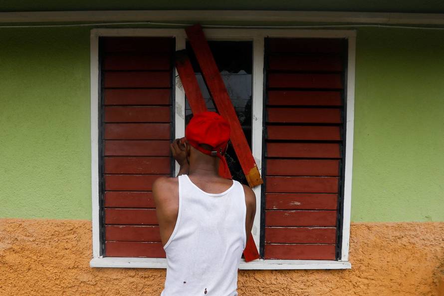 Jamaicans make preparations ahead of the arrival of Hurricane Melissa