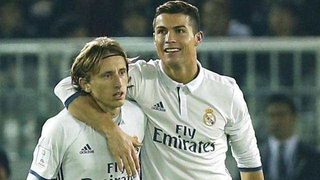 Real Madrid's Cristiano Ronaldo celebrates scoring their fourth goal with Luka Modric