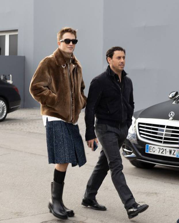 Robert Pattinson wearing a kilt leaves Dior show - Paris