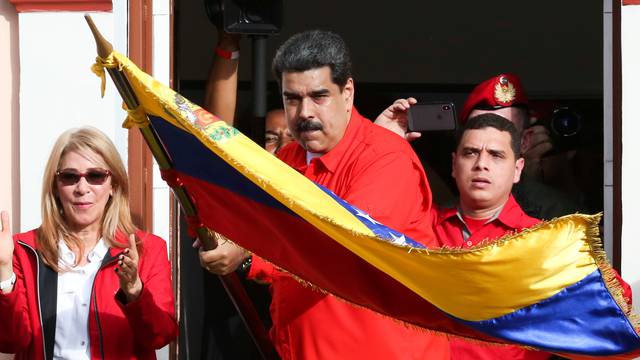 Venezuela's President Nicolas Maduro attends a rally in support of his government and to commemorate the 61st anniversary of the end of the dictatorship of Marcos Perez Jimenez in Caracas