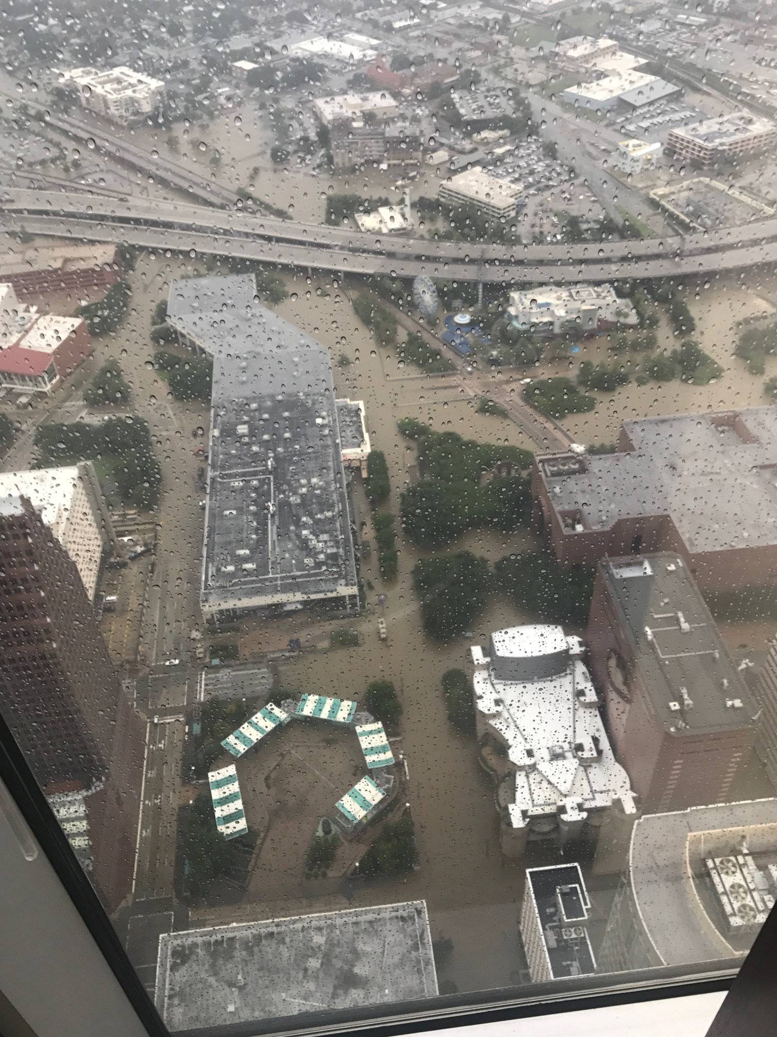 Flooded downtown is seen from JP Morgan Chase Tower after Hurricane Harvey inundated the Texas Gulf coast with rain causing widespread flooding, in Houston