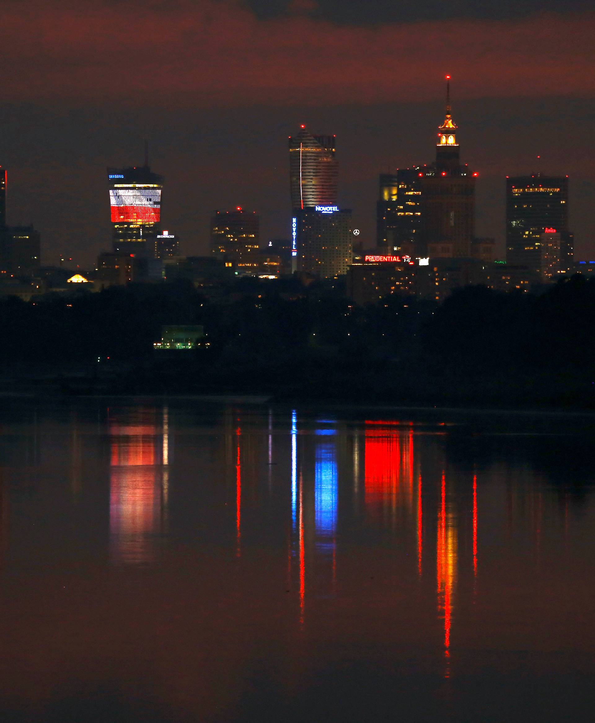 Skyline of Warsaw skyscrapers is pictured after sunset in Warsaw