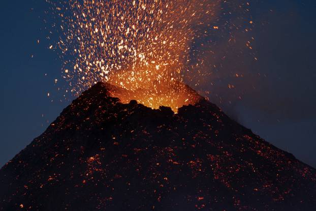 Italy's Mount Etna erupts