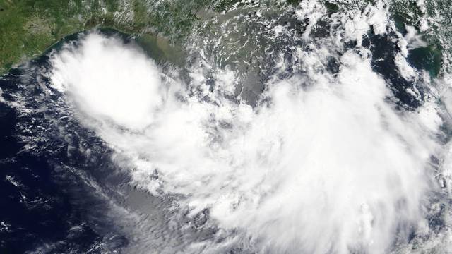 Tropical Storm Barry is shown in the Gulf of Mexico approaching the coast of Louisiana