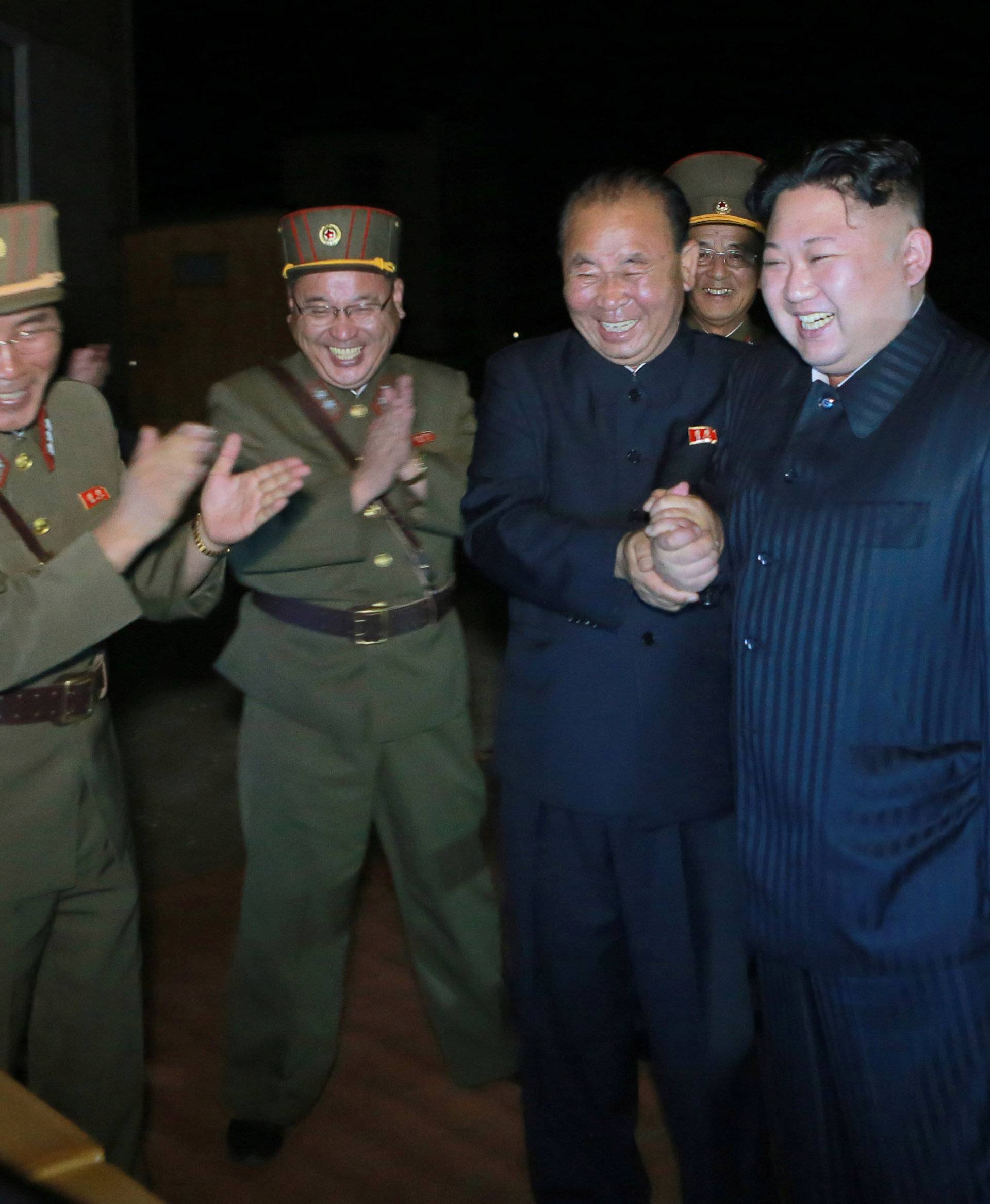 North Korean leader Kim Jong Un guides the second test-fire of intercontinental ballistic missile (ICBM) Hwasong-14