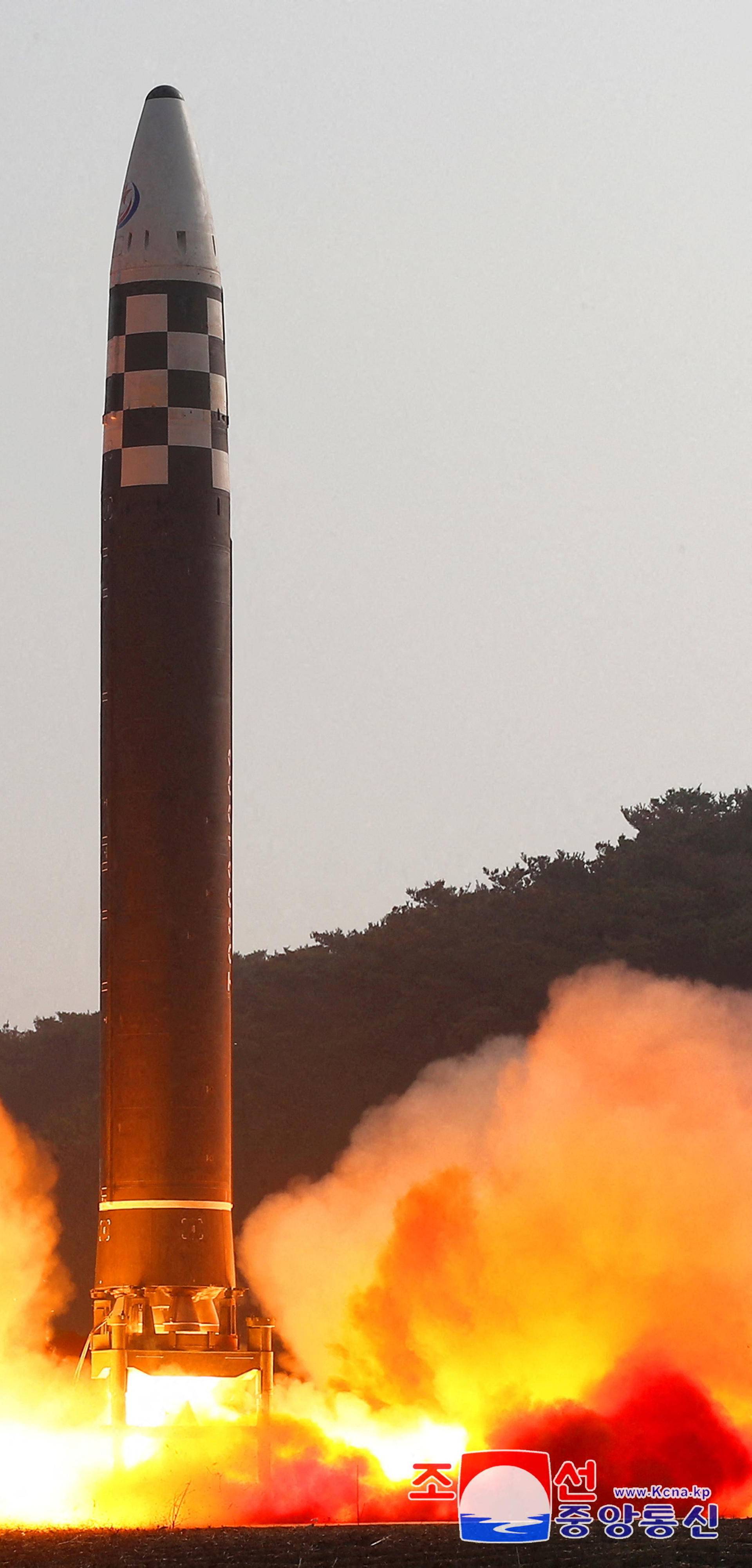 General view during the test firing of what state media report is a North Korean "new type" of intercontinental ballistic missile (ICBM)