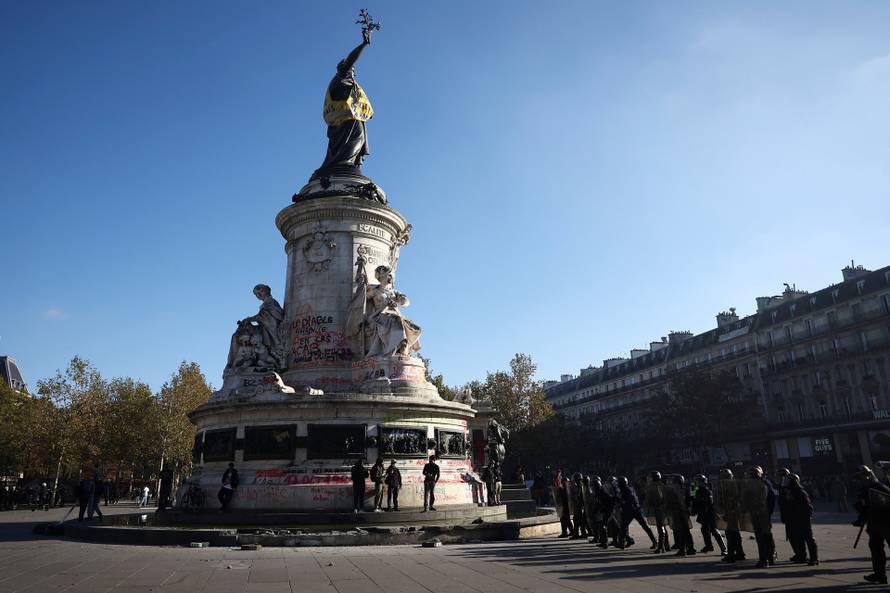 Demonstrators gather at the Place de la Republique, in Paris