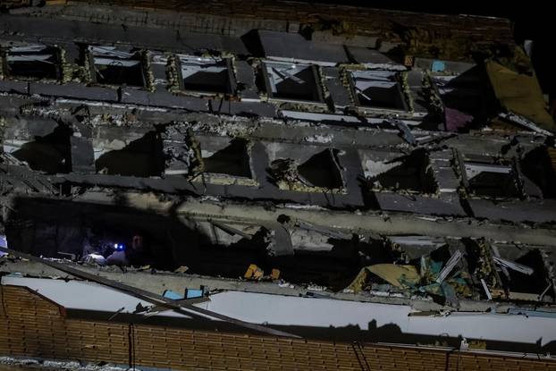 Aftermath of an overnight Russian drone and missile strike in Kyiv