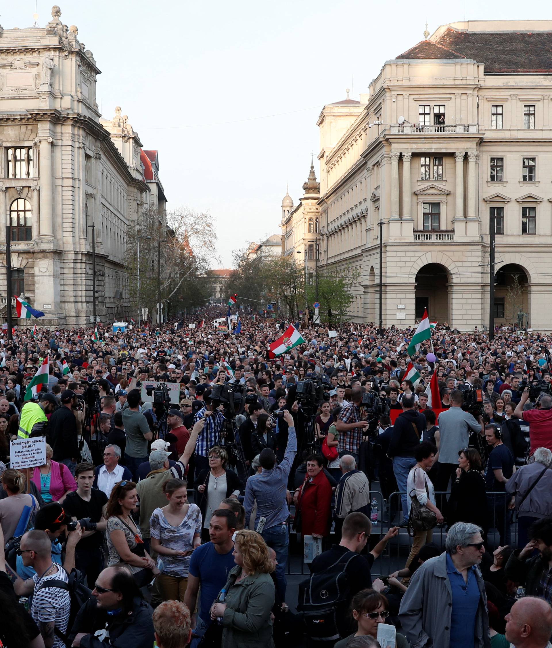 People attend a protest against the government of Prime Minister Viktor Orban in Budapest