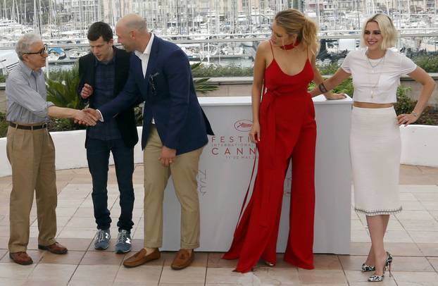 Director Woody Allen and cast members Jesse Eisenberg, Corey Stoll, Blake Lively and Kristen Stewart arrive for a photocall for the film "Cafe Society" out of competition before the opening of the 69th Cannes Film Festival in Cannes