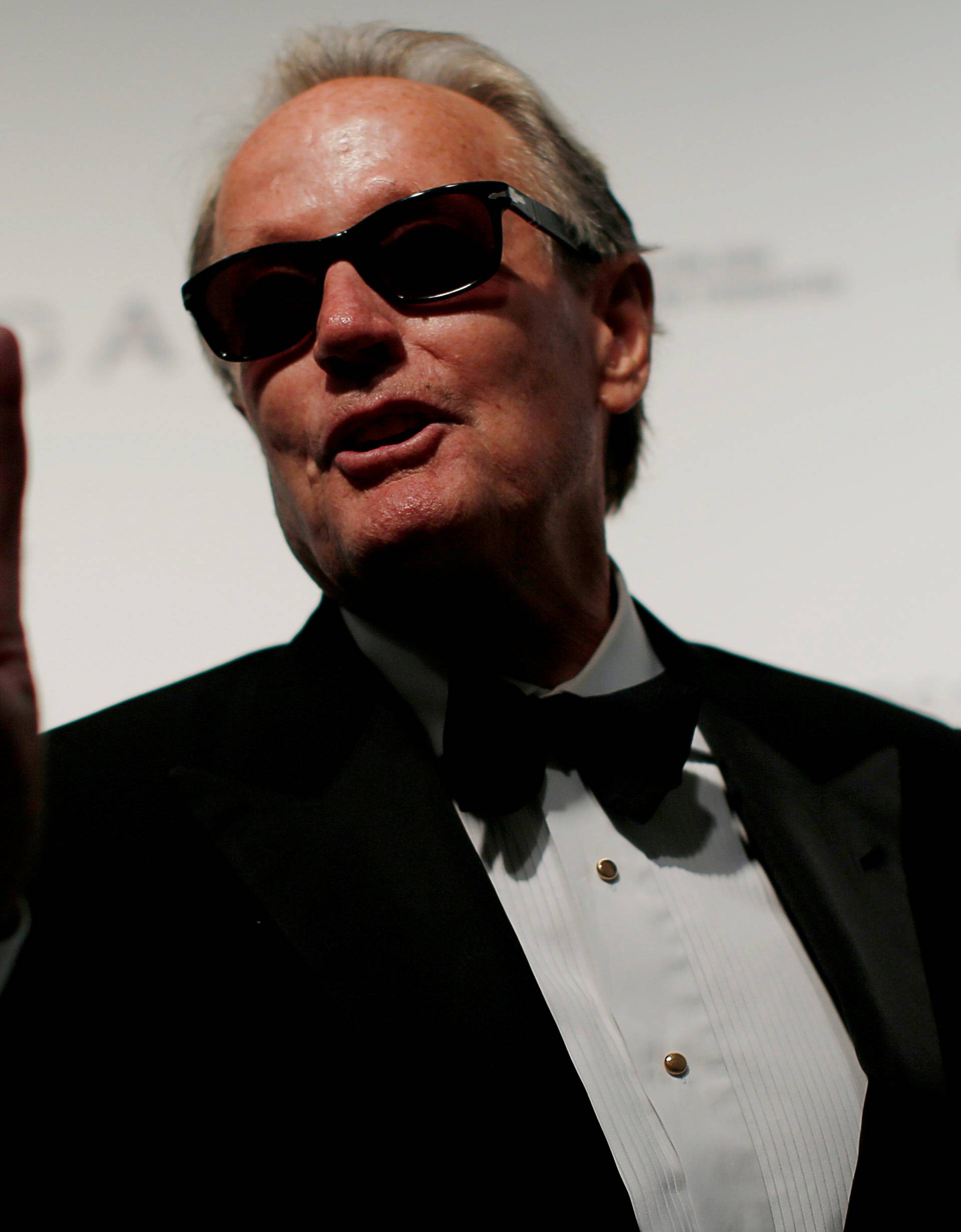 FILE PHOTO: Actor Peter Fonda gestures during the 2017 Elton John AIDS Foundation Academy Awards Viewing Party in Los Angeles, California