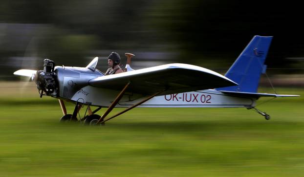 Aviator Frantisek Hadrava takes off with Vampira, an ultralight plane based on the U.S.-design of light planes called Mini-Max, near the village of Zdikov