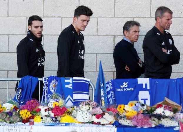 Harry Maguire and Matty James look at tributes left for Leicester City