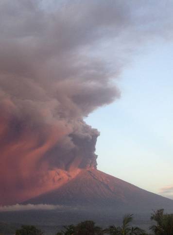 Indonesia's Mount Agung volcano erupts as seen from Amed, Karangasem, Bali