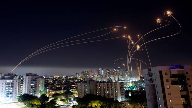 Israel's Iron Dome anti-missile system intercepts rockets launched from the Gaza Strip, as seen from the city of Ashkelon