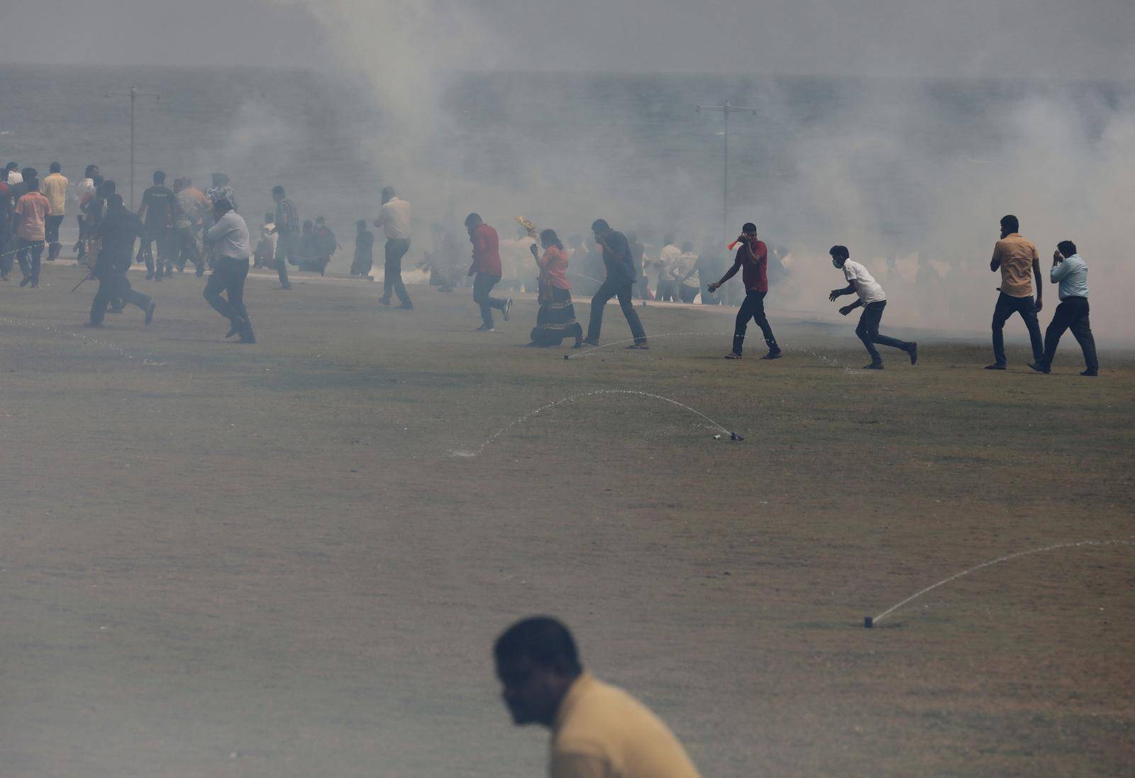 Sri Lanka's ruling party supporters storm anti-government protest camp, in Colombo