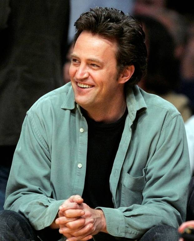 FILE PHOTO: U.S. actor Perry watches Los Angeles Lakers NBA game against Seattle Supersonics in Los Angeles