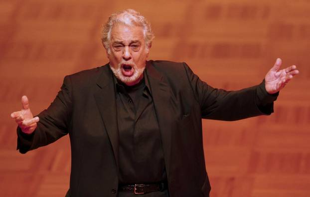 FILE PHOTO: Opera singer Domingo performs during a dress rehearsal the day before the traditional Opera Ball in Vienna