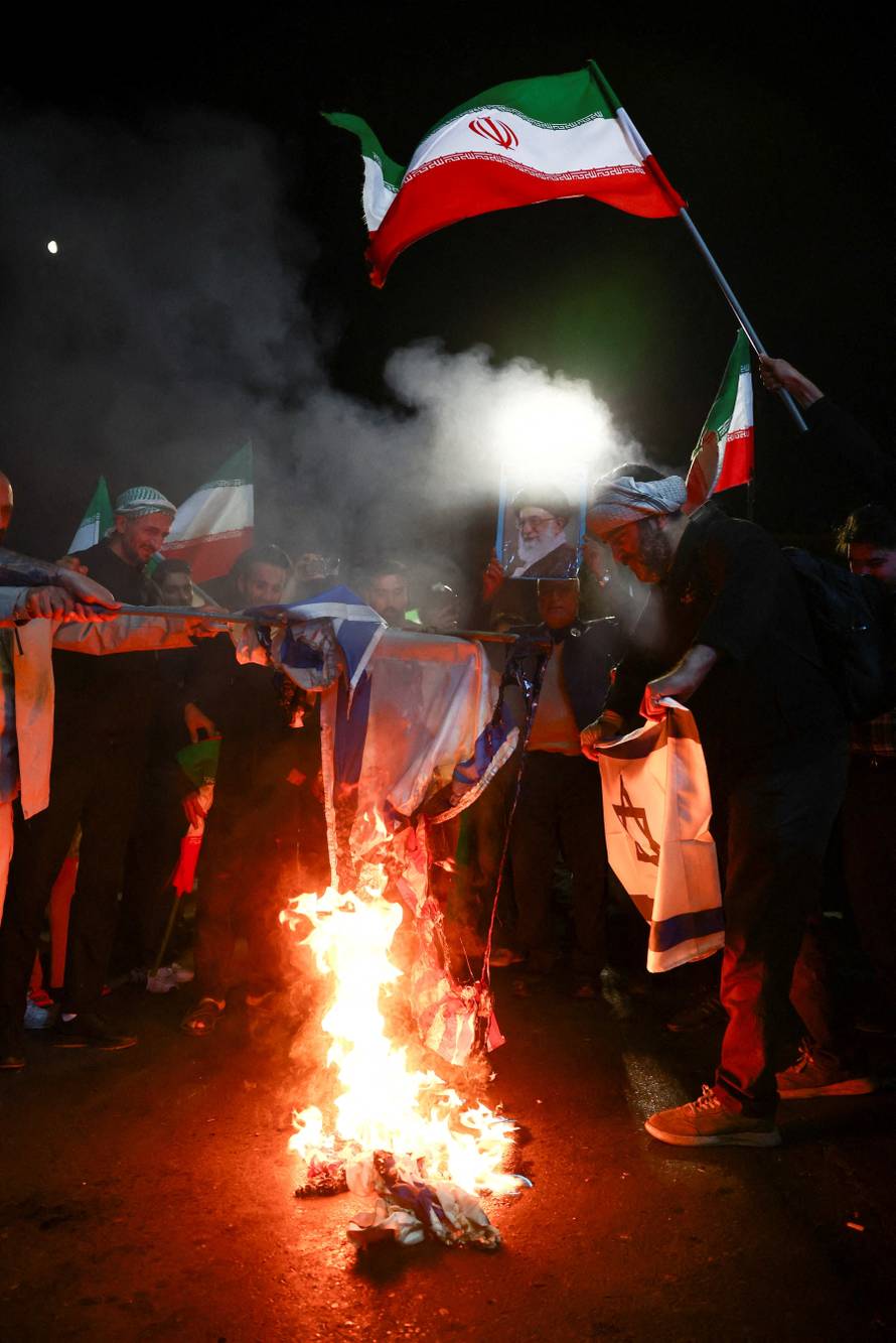 People gather after a two-week ceasefire in the Iran war was announced, in Tehran