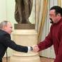 FILE PHOTO: Russia's President Putin meets U.S. actor Seagal in Moscow